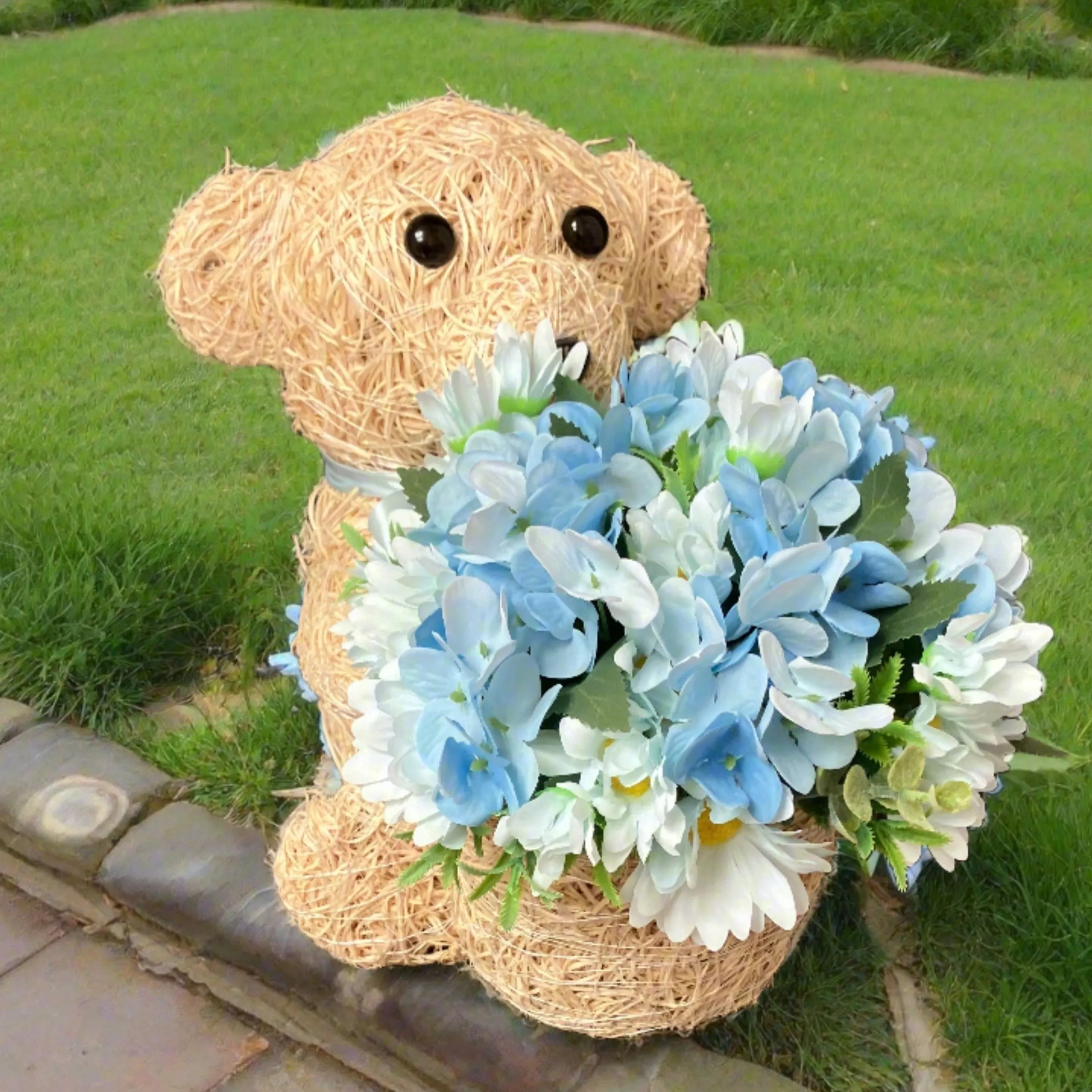 Child graveside memorial teddy with blue or pink flowers