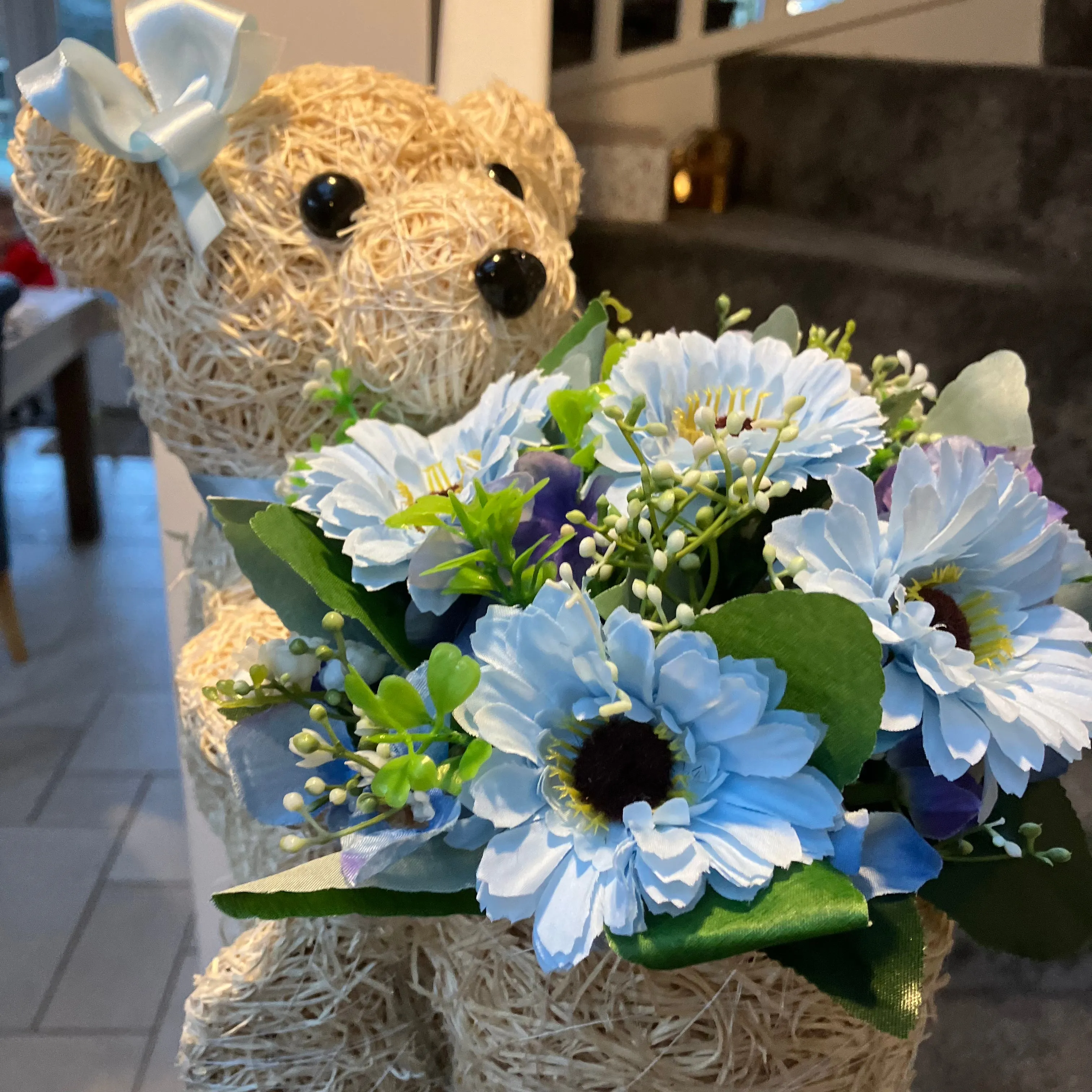 Child graveside memorial teddy with pink or blue flower arrangement