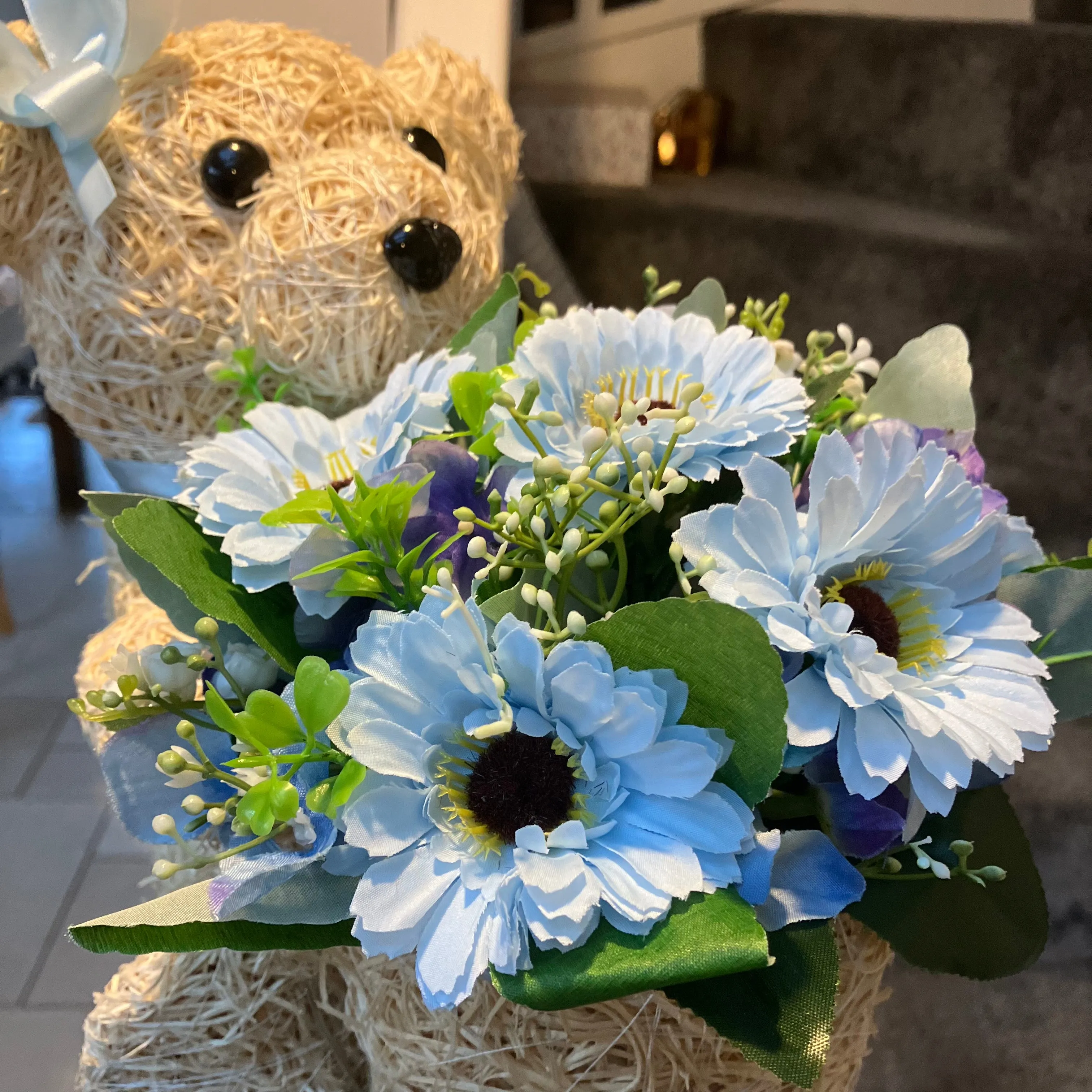 Child graveside memorial teddy with pink or blue flower arrangement