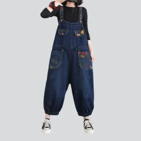 Women's denim overall with drawstrings